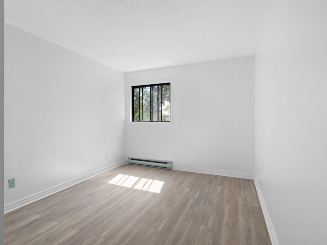 Bedroom with a window over the grounds