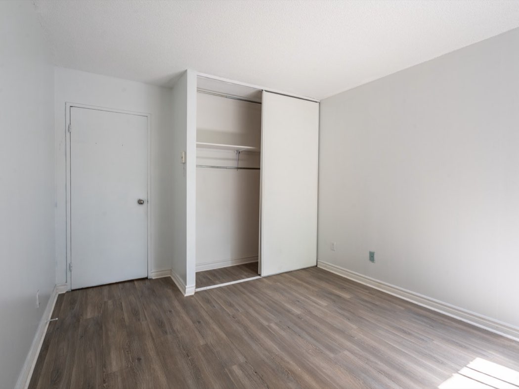 Second bedroom with a fitted wardrobe