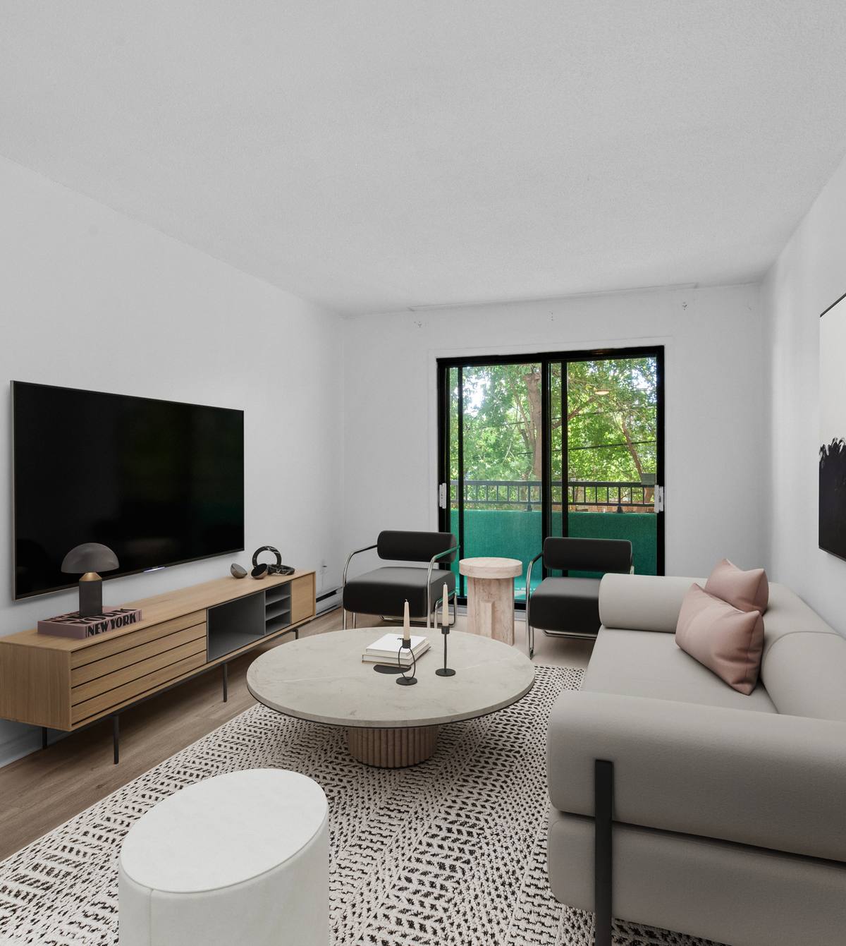 Staged living room in a 4½ at 1700 boulevard Lévesque Est
