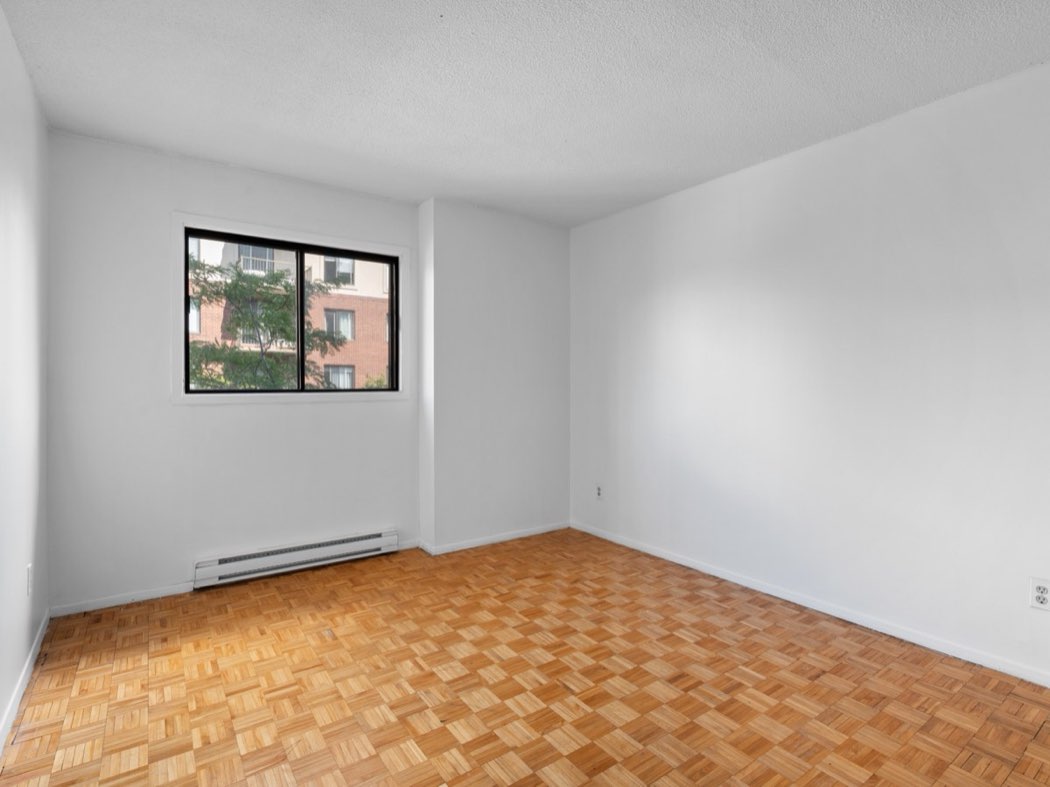 Bedroom with parquet floor