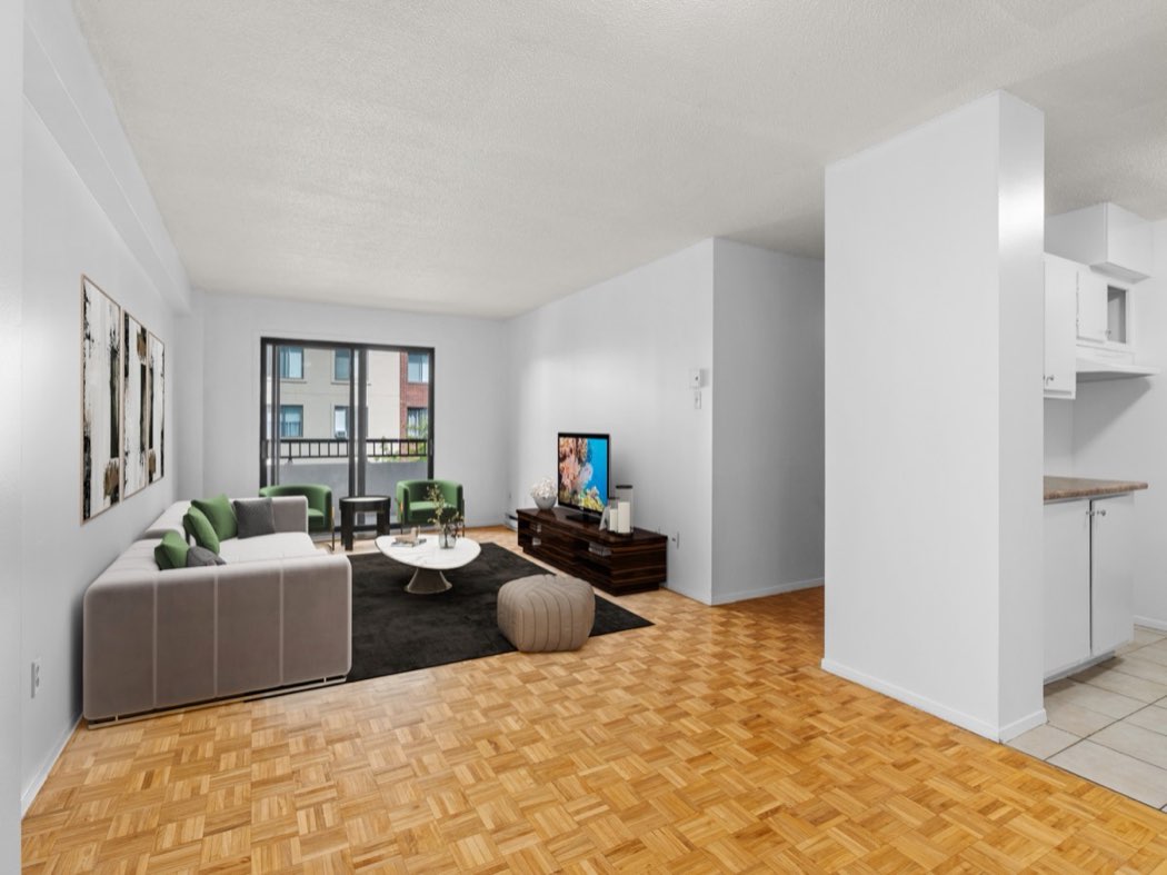 Staged living room with parquet floor