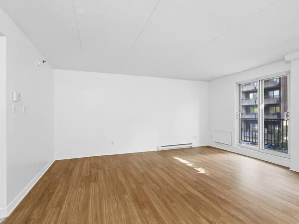 The main room with a sliding balcony door.