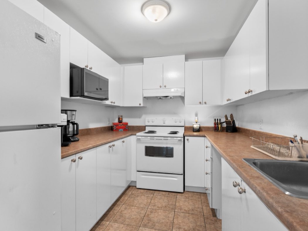 Kitchen with cooker and counter space
