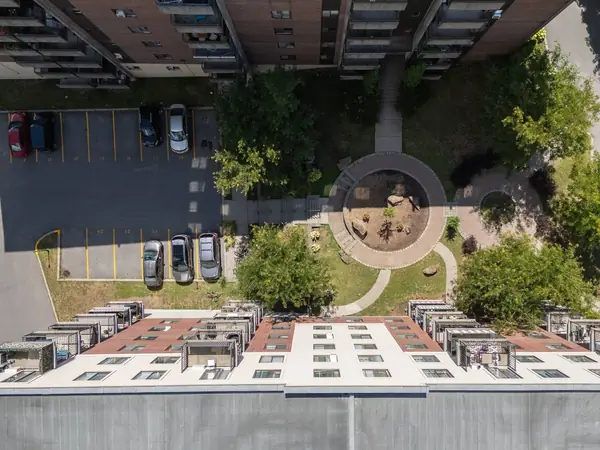 The roof, parking and courtyard seen from directly above.