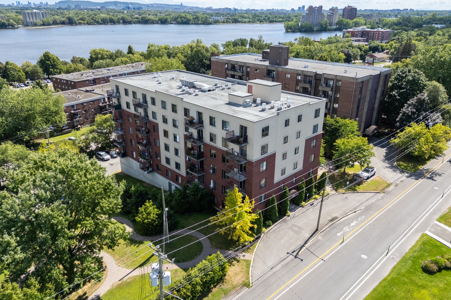 The building from the air, beside the river