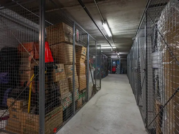 The row of storage lockers in the basement.