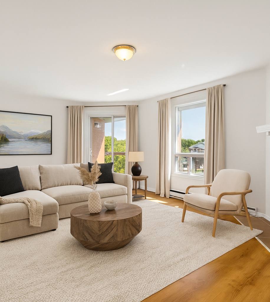 Staged living room at Place Mercier, Candiac