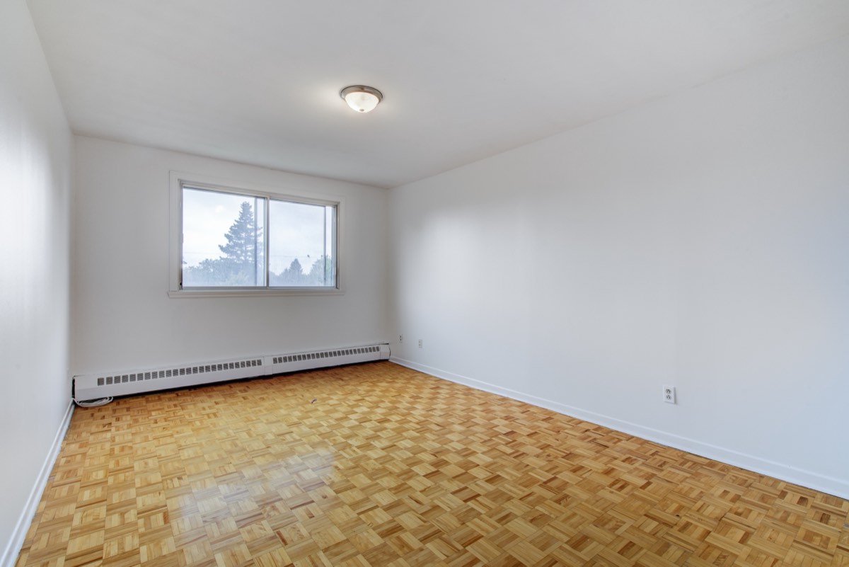 Second bedroom with parquet floor