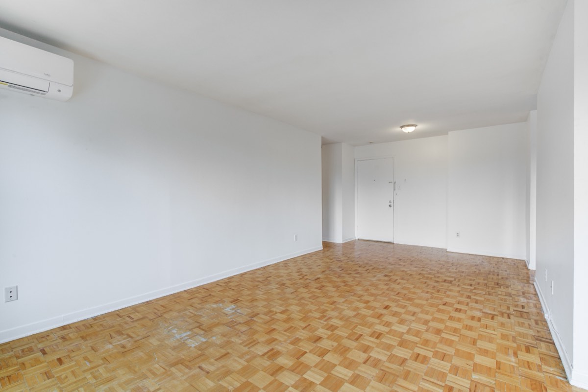 Living and dining area looking toward the hall