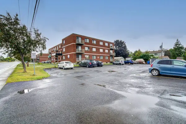 The outdoor parking lot beside the buildings