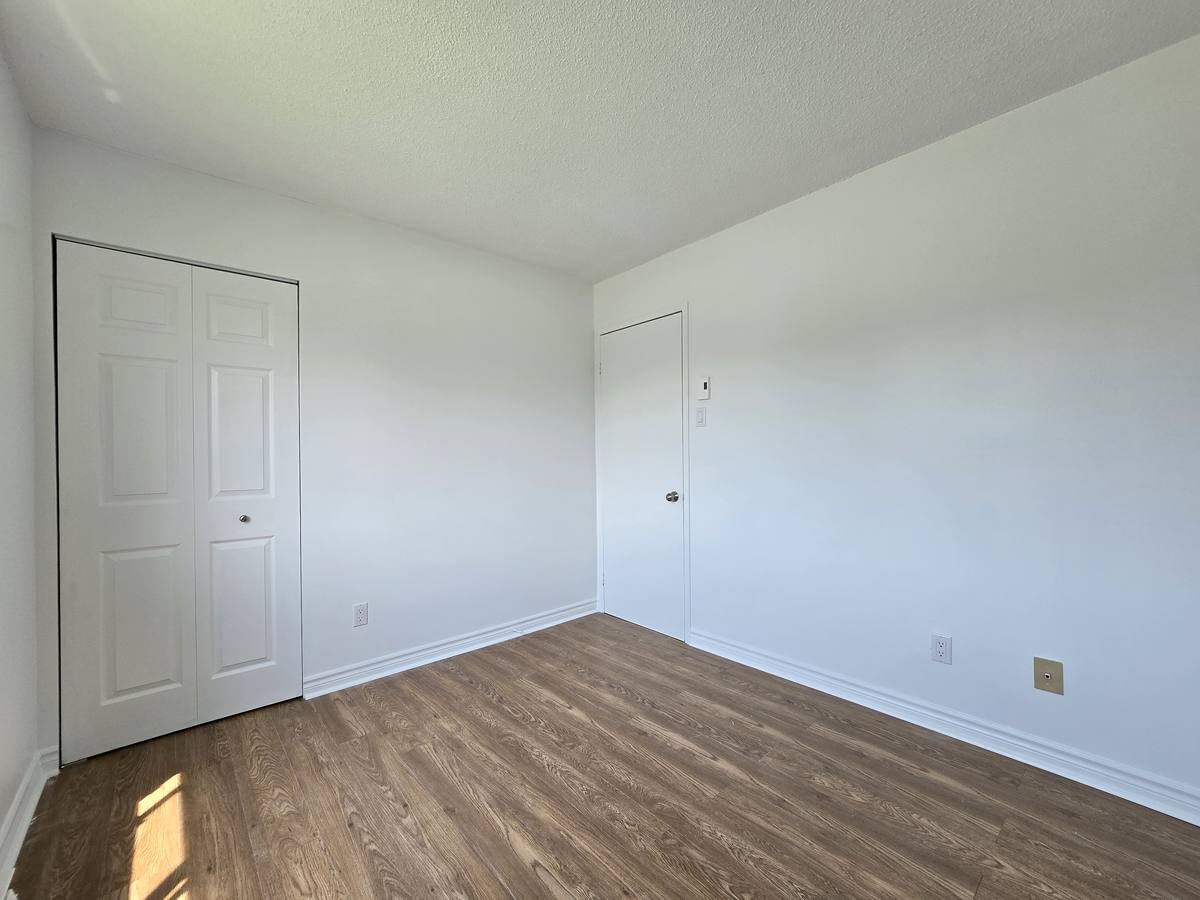 Bedroom with a double closet door in the 5½