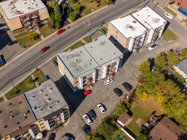 The buildings, the boulevard and the parking behind, from the air