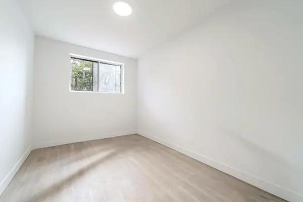 Second bedroom with a window