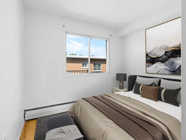 Staged bedroom with double bed